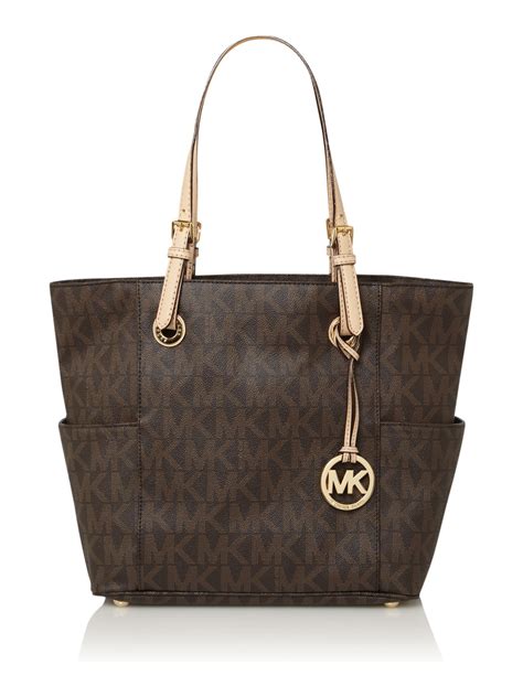 michael kors jet set monogram purse|Michael Kors canvas shoulder bag.